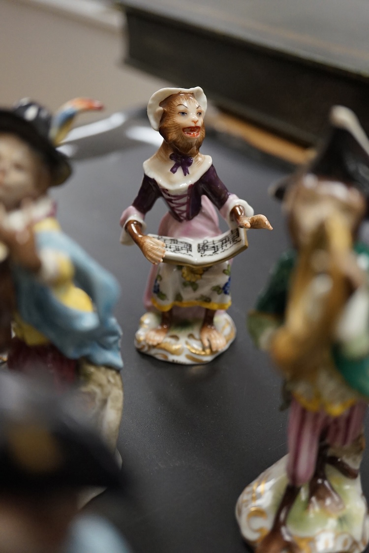 A group of twenty German porcelain monkey band figures, largest 15.5cm high